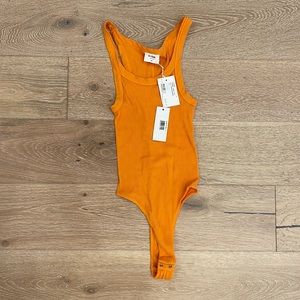 Re/done orange cotton bodysuit. NWT